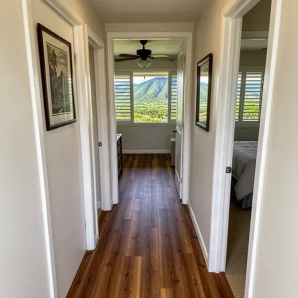 A finished hallway floor in Central Maui Wood-look vinyl plank hallway floor in Waiehu home